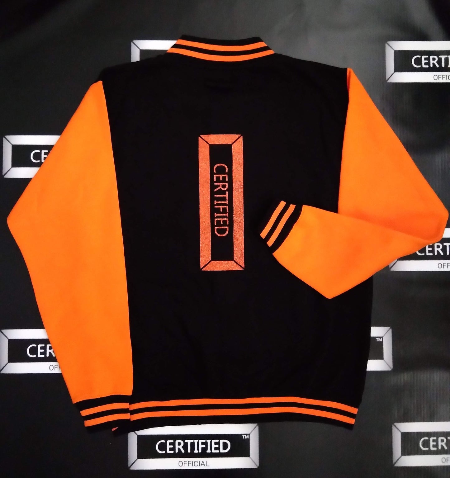 CERTIFIED OFFICIAL [FEMALE] TEAM LETTERMAN JACKET; 100% FLEECE. FRONT/BACK DESIGN.