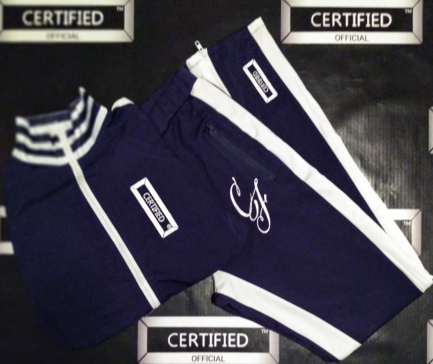 CFEMALE: KHANDI: 2PC. SPLIT SHOULDER TRACKER SET.