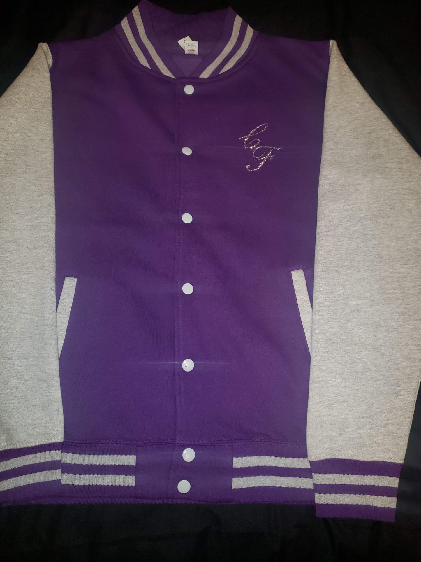 CERTIFIED OFFICIAL [FEMALE] TEAM LETTERMAN JACKET; 100% FLEECE. FRONT/BACK DESIGN.